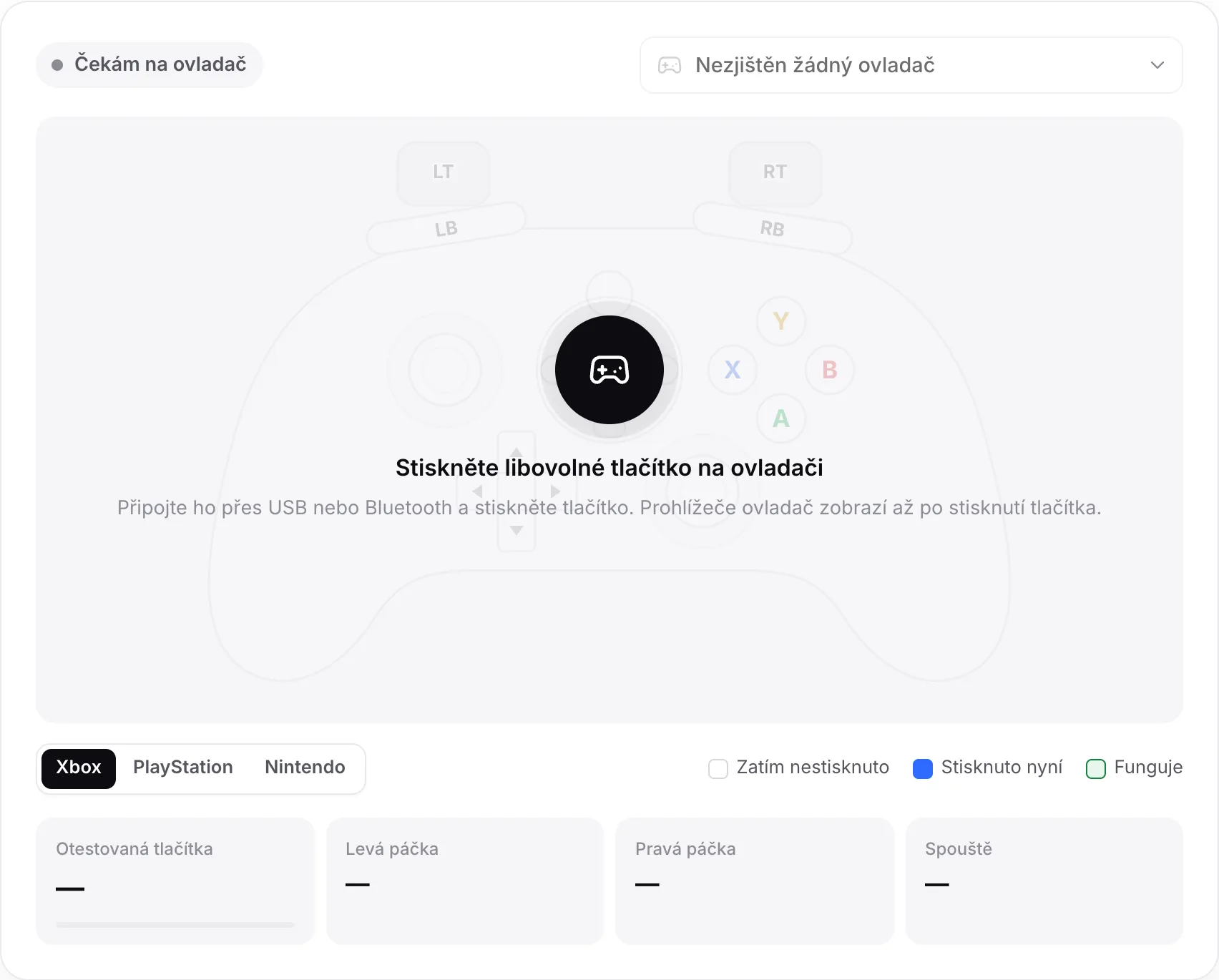 Test gamepadu čekající na ovladač se zprávou „Stiskněte libovolné tlačítko na ovladači“