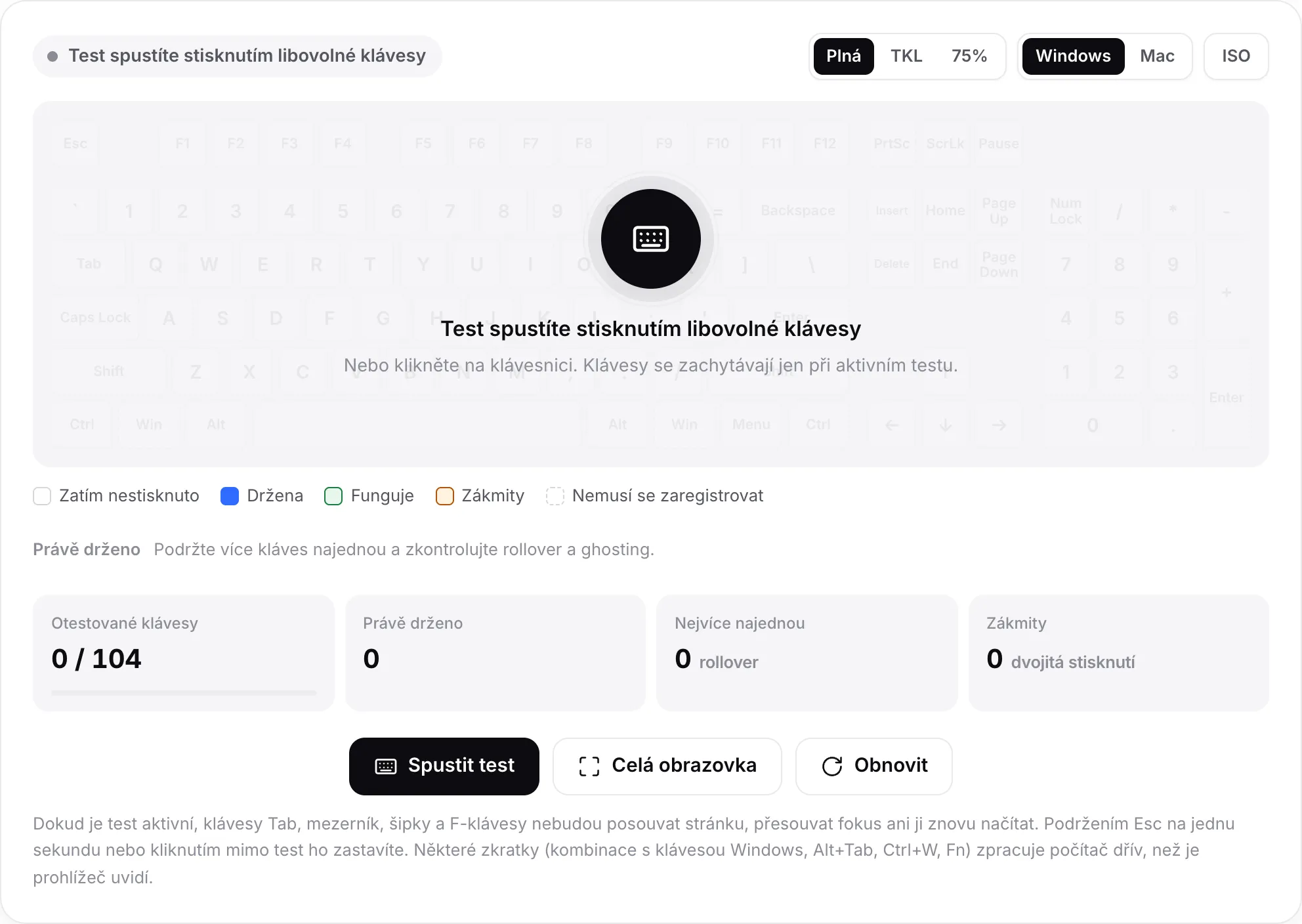 Test klávesnice před spuštěním se zprávou „Test spustíte stisknutím libovolné klávesy“ nad vybledlou klávesnicí