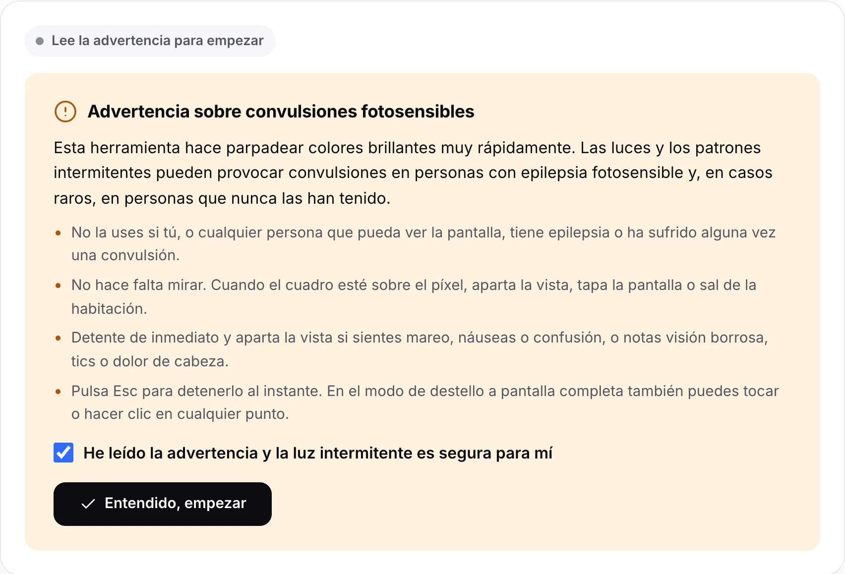 La advertencia sobre convulsiones fotosensibles con su casilla marcada y el botón Entendido, empezar