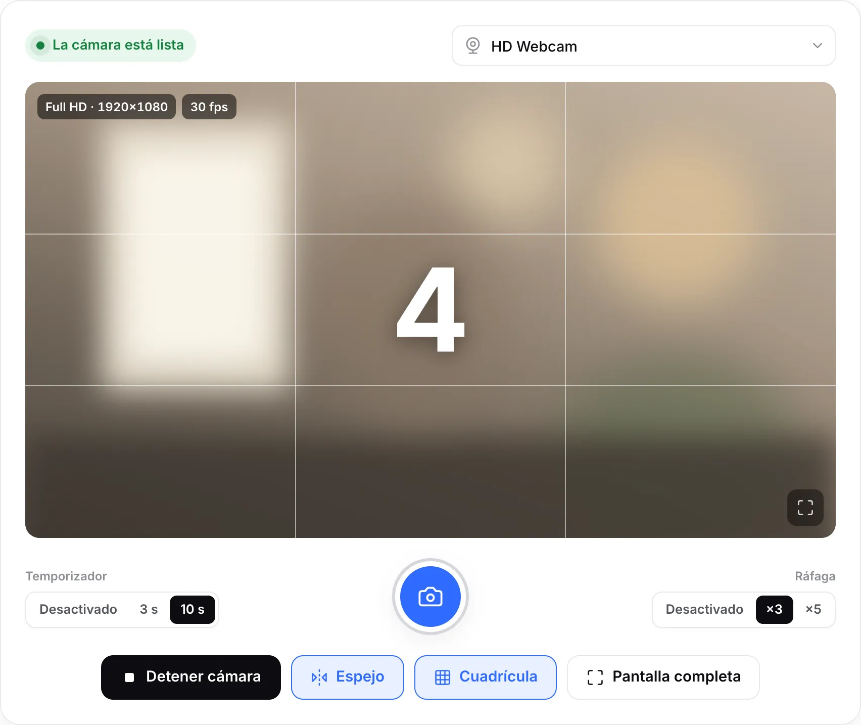 Una cuenta atrás de 10 segundos sobre la imagen en directo, mostrando 4, con el botón del obturador resaltado