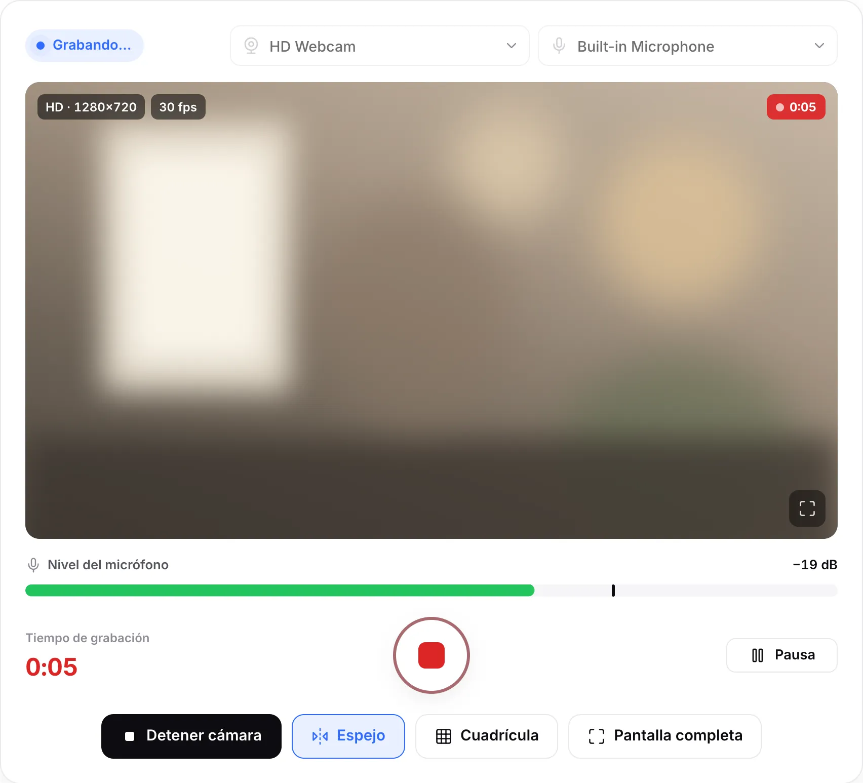 Una grabación en curso: el temporizador rojo sobre la imagen, el tiempo de grabación, el botón cuadrado de detener y el botón Pausa