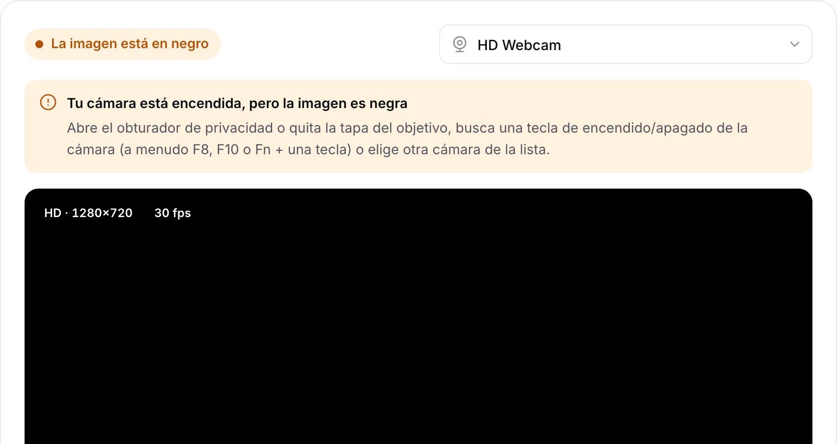 La prueba de webcam mostrando el aviso “Tu cámara está encendida, pero la imagen es negra” sobre una imagen negra