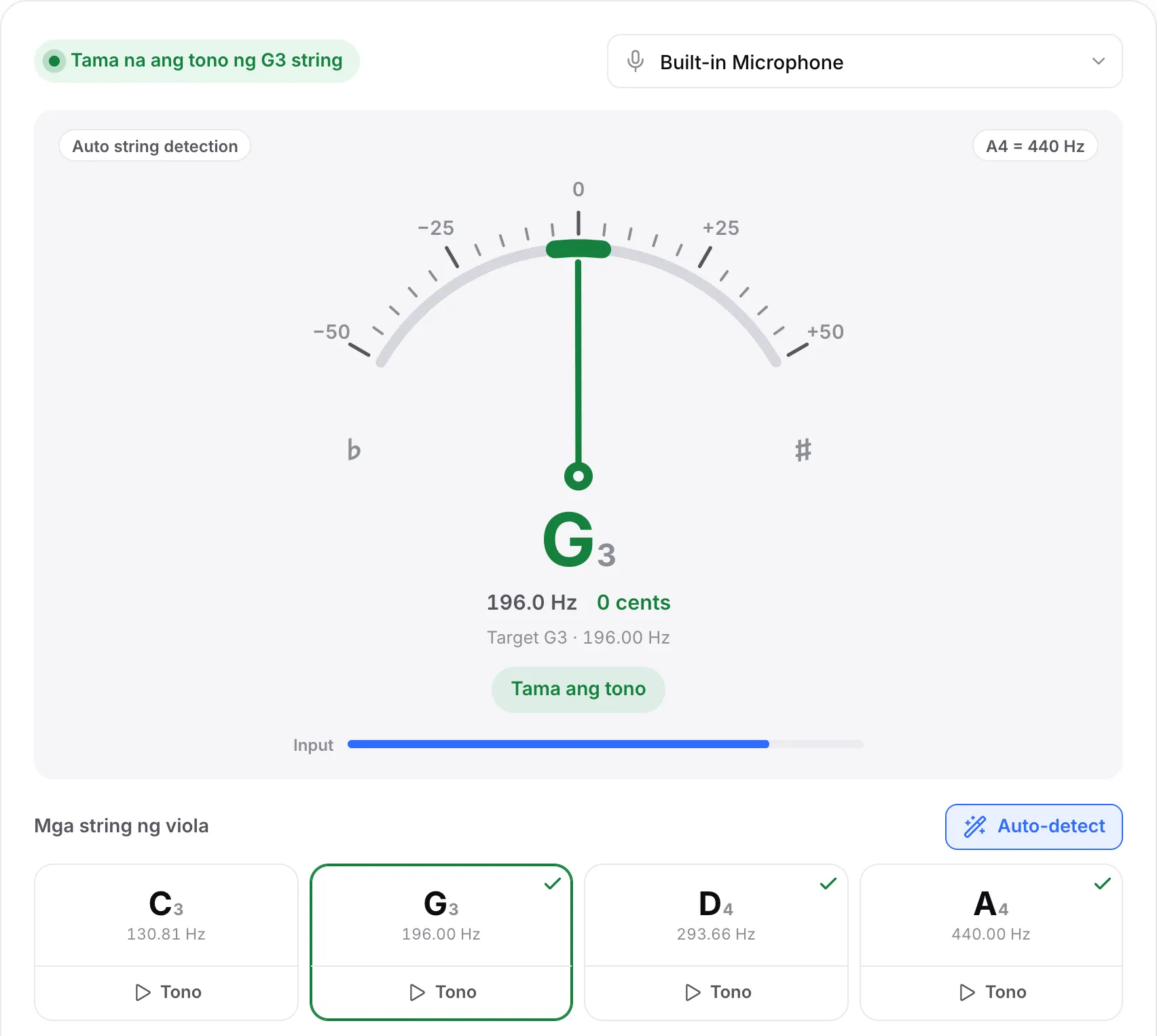 Ang G string na tama ang tono: berdeng karayom sa 0 cent, ang status na “G3 string is in tune” at mga check mark sa mga string na G, D at A