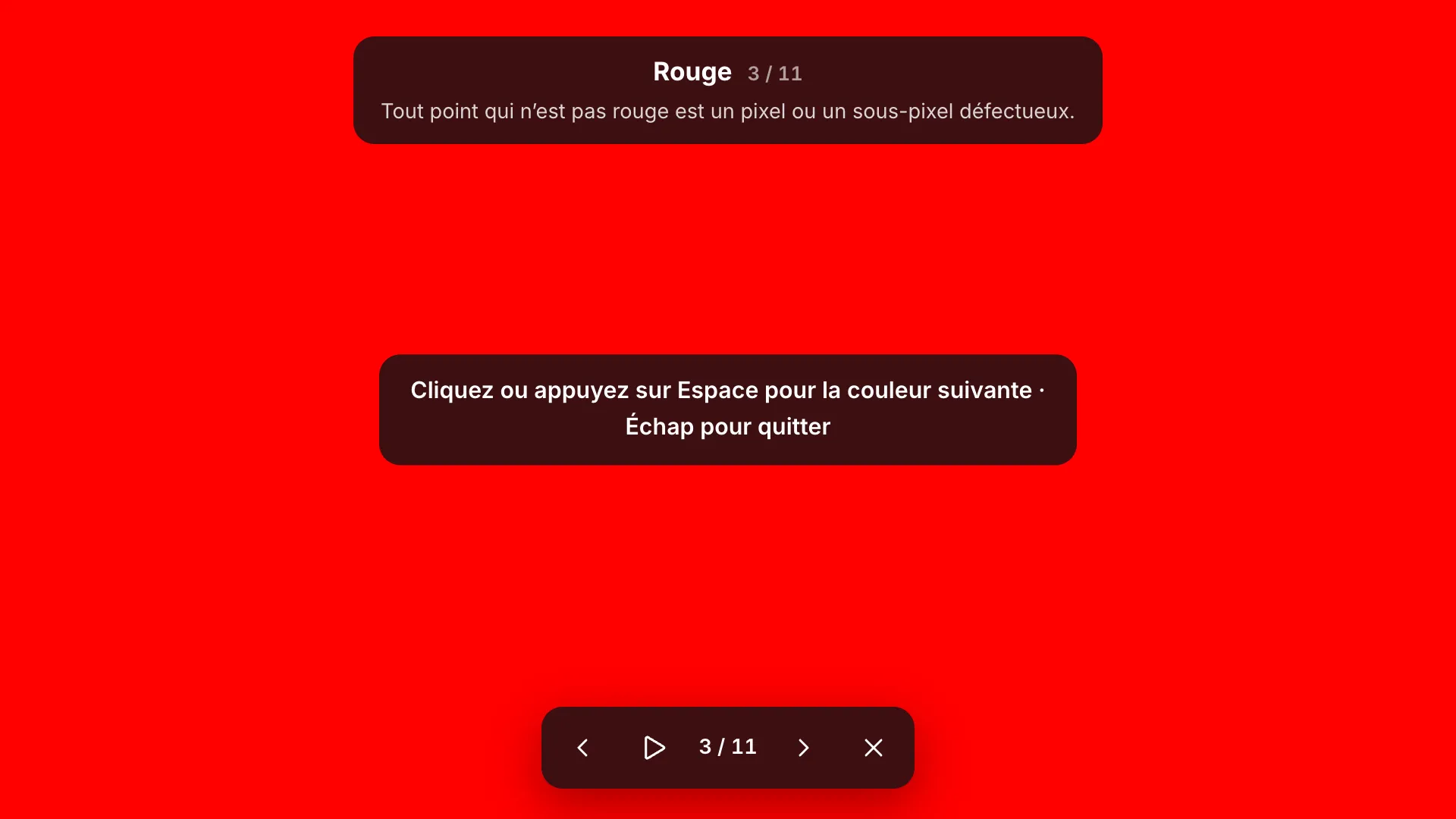 L’écran de test rouge en plein écran avec l’étiquette « Rouge 3 / 11 » et son conseil, l’indication « Cliquez ou appuyez sur Espace pour la couleur suivante · Échap pour quitter » et la barre d’outils en bas