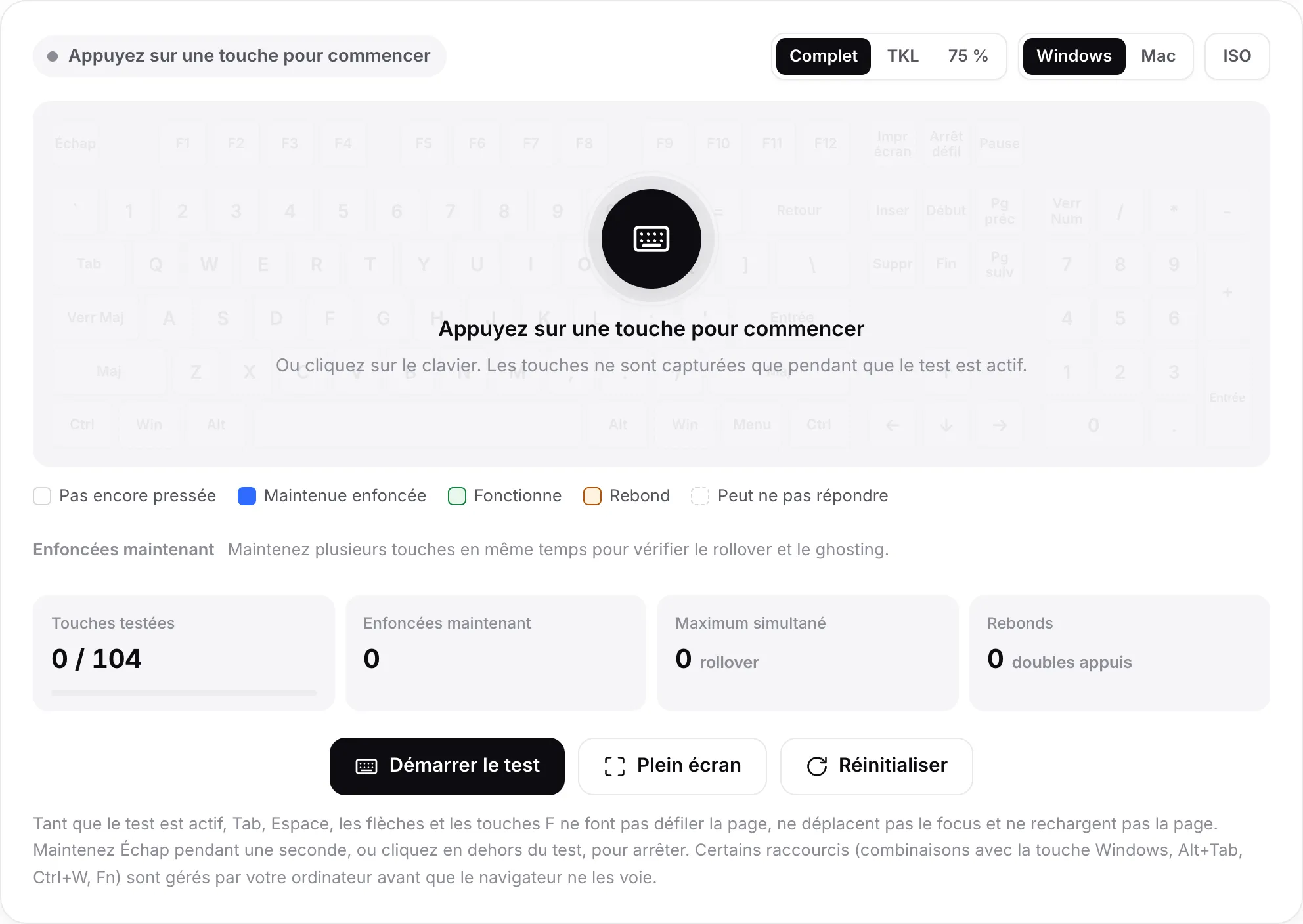 Le test du clavier avant son démarrage, avec le message « Appuyez sur une touche pour commencer » sur un clavier estompé