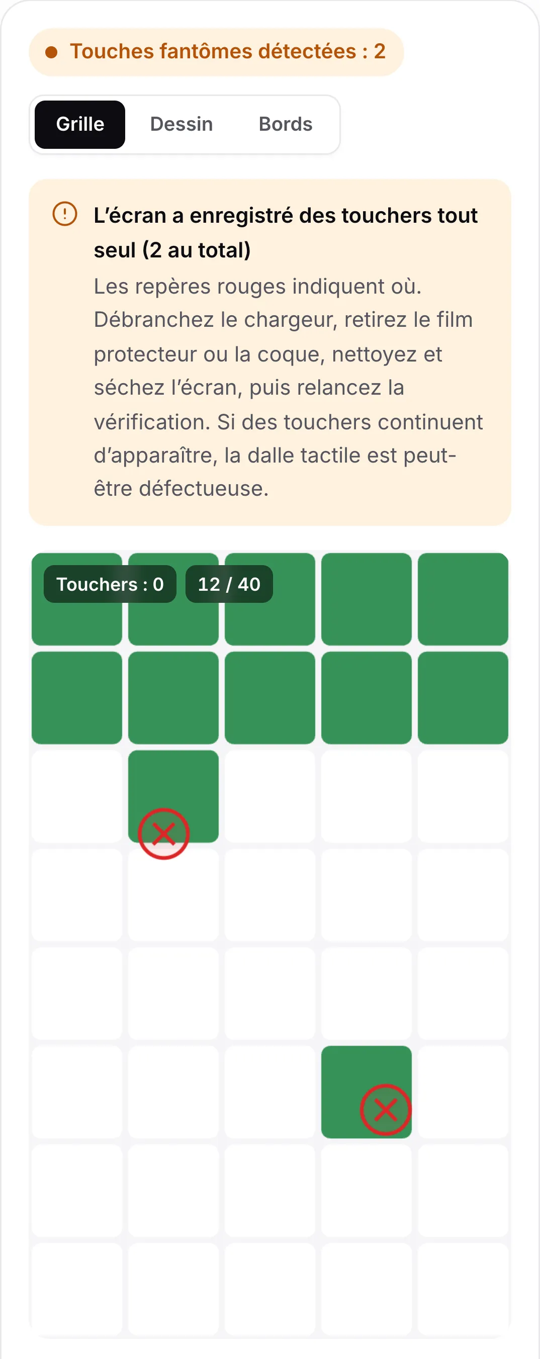 Résultat de la vérification des touches fantômes : l’état orange « Touches fantômes détectées : 2 », le conseil de débrancher le chargeur et de nettoyer l’écran, et deux repères rouges sur la grille