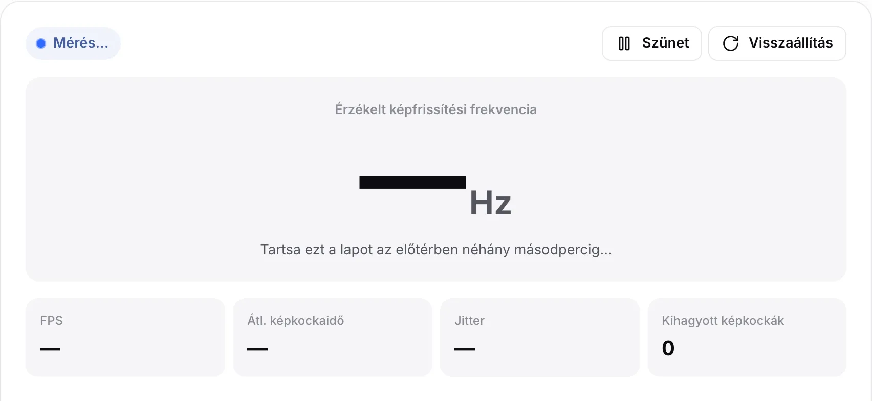 A képfrissítési frekvencia teszt mérés közben, a „Mérés…” állapottal és a „Tartsa ezt a lapot az előtérben néhány másodpercig…” súgóval