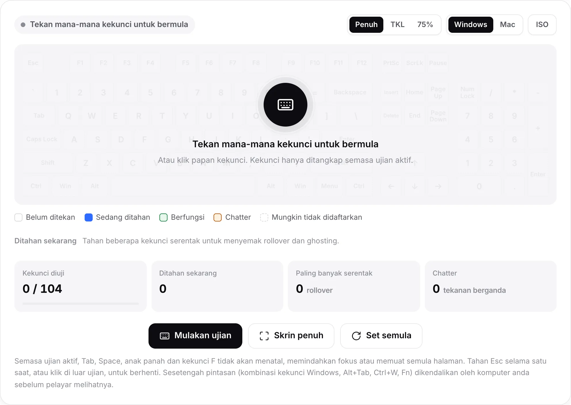 Ujian papan kekunci sebelum bermula, dengan mesej “Tekan mana-mana kekunci untuk bermula” di atas papan kekunci yang pudar