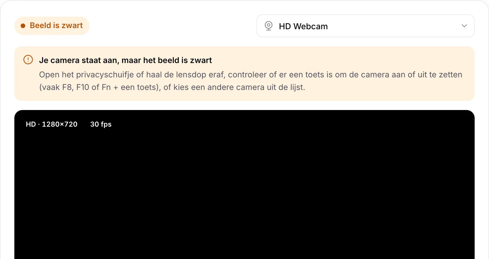 De webcamtest met de waarschuwing “Je camera staat aan, maar het beeld is zwart” boven een zwart beeld