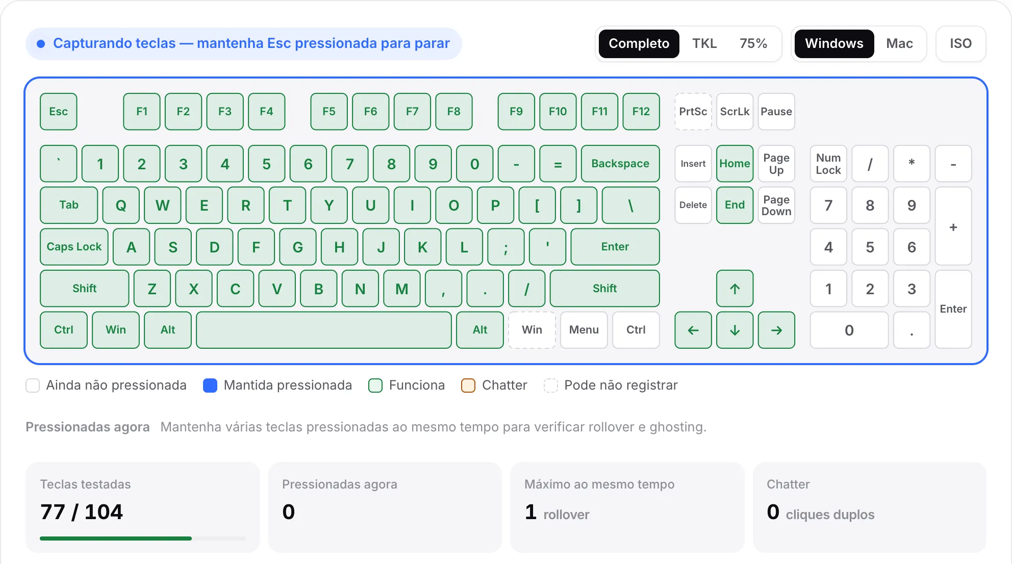 O teclado virtual com a maioria das teclas verdes, o teclado numérico ainda branco e Teclas testadas em 77 de 104