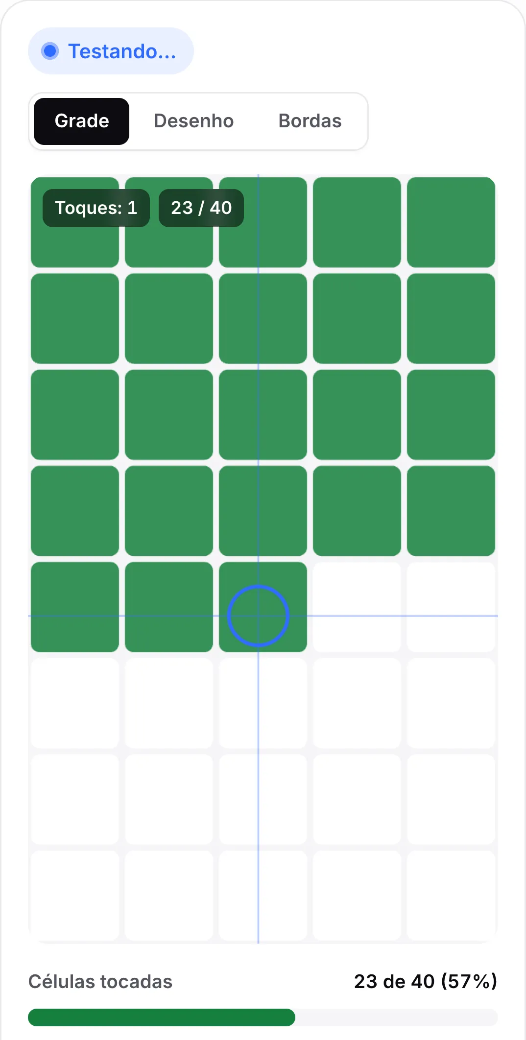 Modo Grade em um celular: as primeiras linhas de células estão verdes, um anel azul e uma mira marcam o dedo e a barra mostra 23 de 40 células tocadas