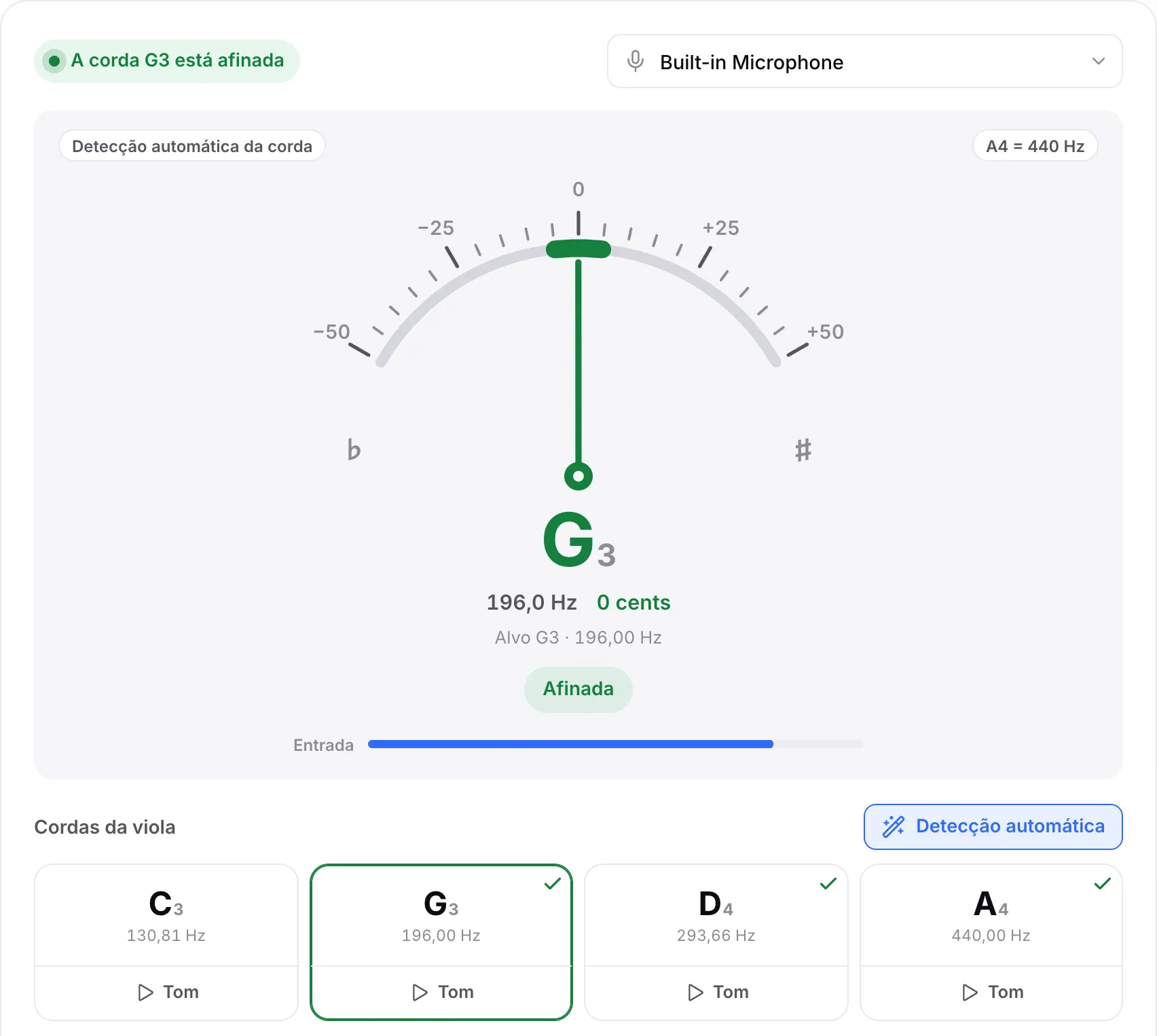 A corda G afinada: um ponteiro verde em 0 cents, o status “A corda G3 está afinada” e sinais de confirmação nas cordas G, D e A