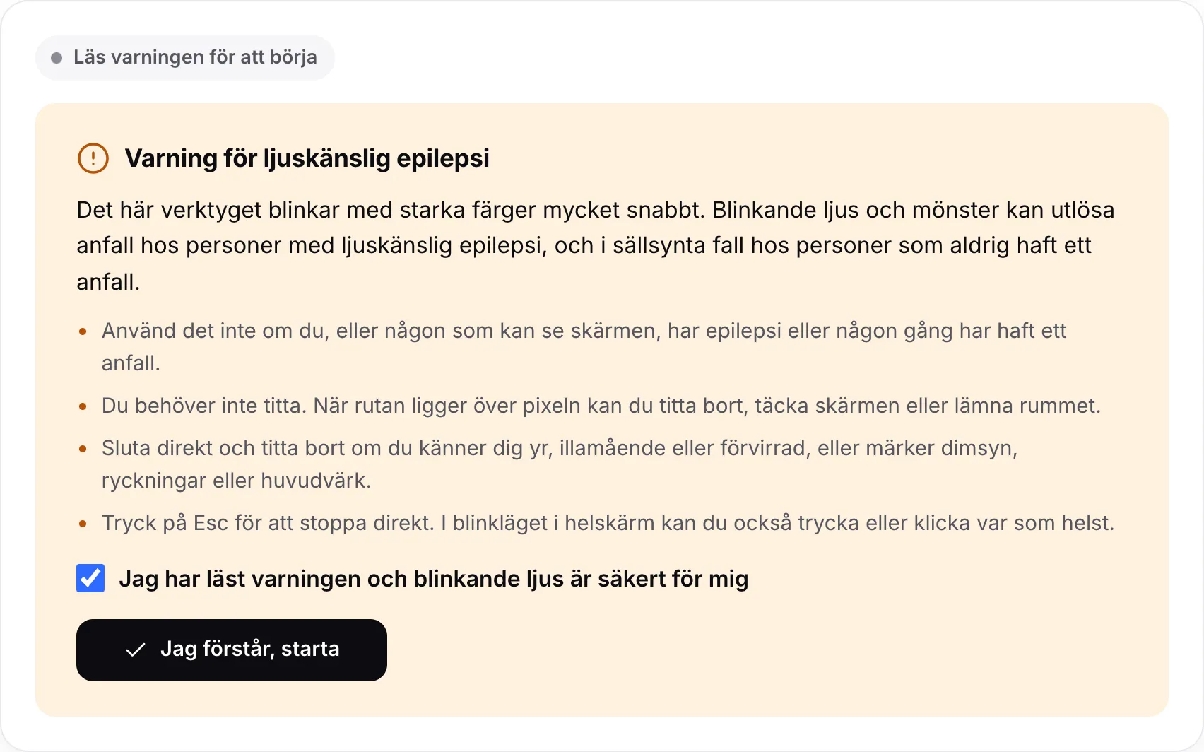 Varningen för ljuskänslig epilepsi med ikryssad ruta och knappen Jag förstår, starta